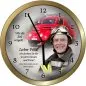Preview: Uhr zum Jubiläum eines Feuerwehrkameraden, im HIntergrund altes Einsatzfahrzeug, im Vordergrund ein aktuelles Bild des Feuerwehrmanns in Uniform